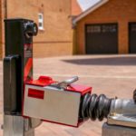 Security Post and Hitch Lock by Garage