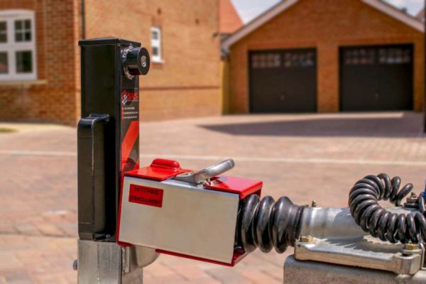 Security Post and Hitch Lock by Garage