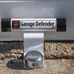 6124871 PJB321 White GARAGE DEFENDER MASTER securing a garage